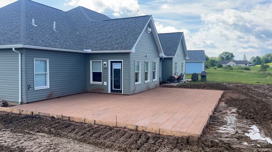 Blue House With Concrete Tiles — Chicora, PA — Ryan Vargo Concrete