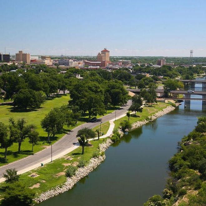 An aerial view of a bridge over a body of water.