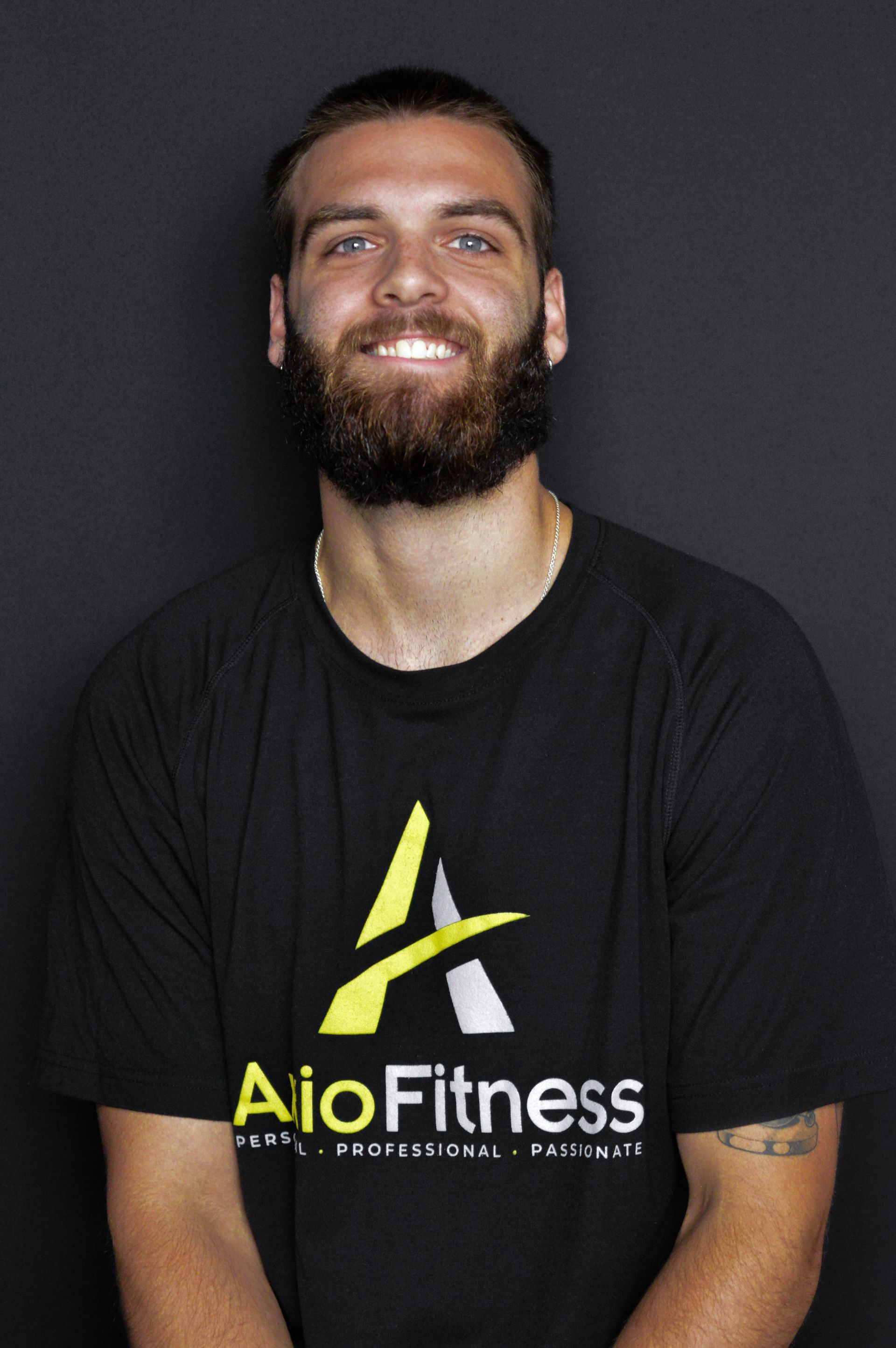 Man with a beard wearing a black