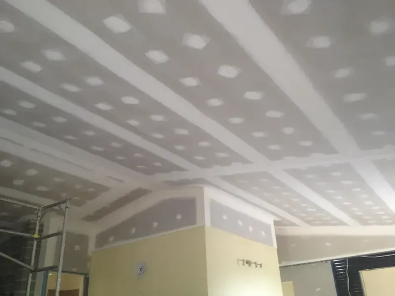 A Room with A Ceiling that Has Holes in It — Completely Plastered North Coast in Goonellabah, NSW