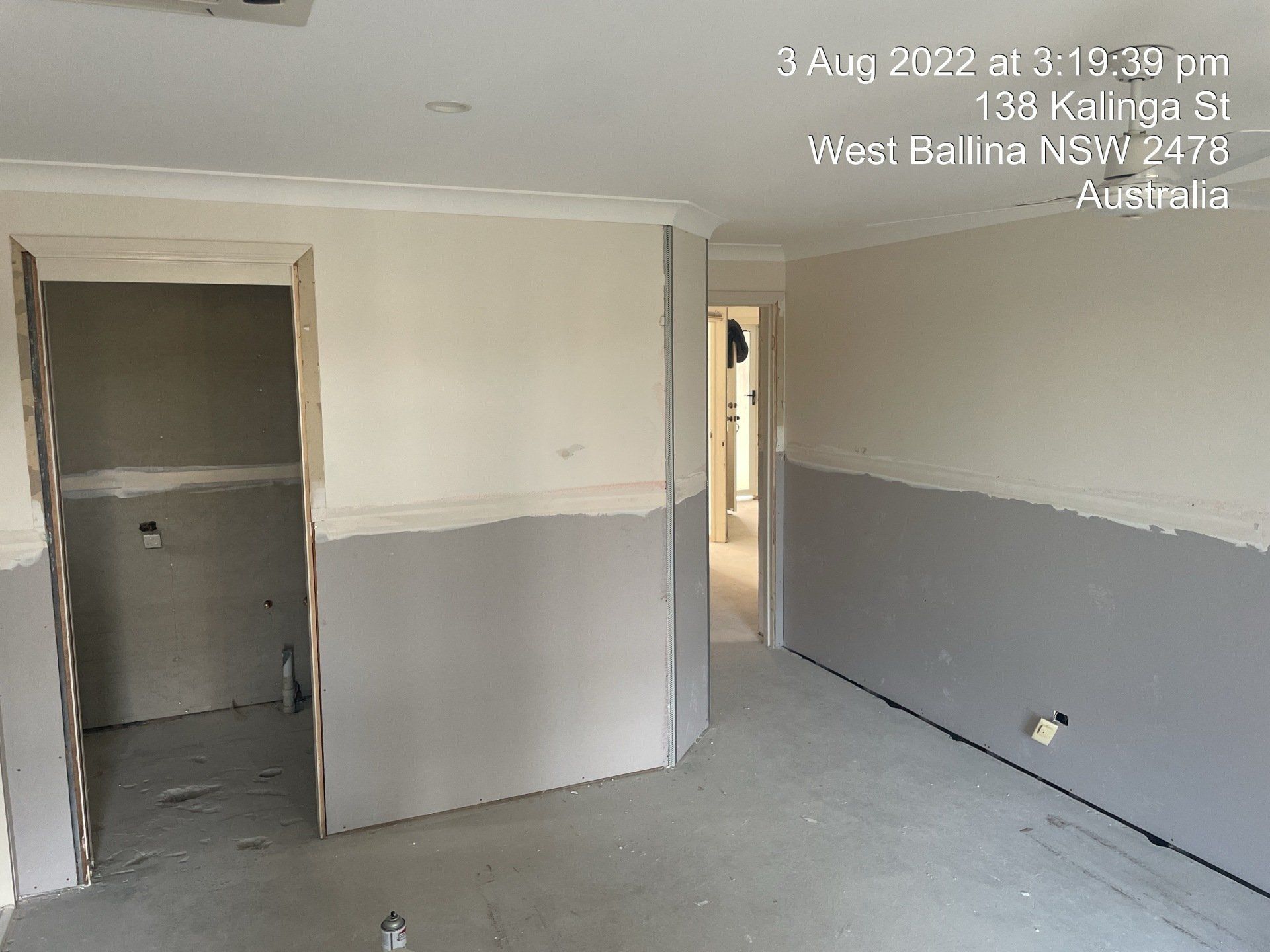 An Empty Room with A Gray Wall and A Door — Completely Plastered North Coast in Goonellabah, NSW