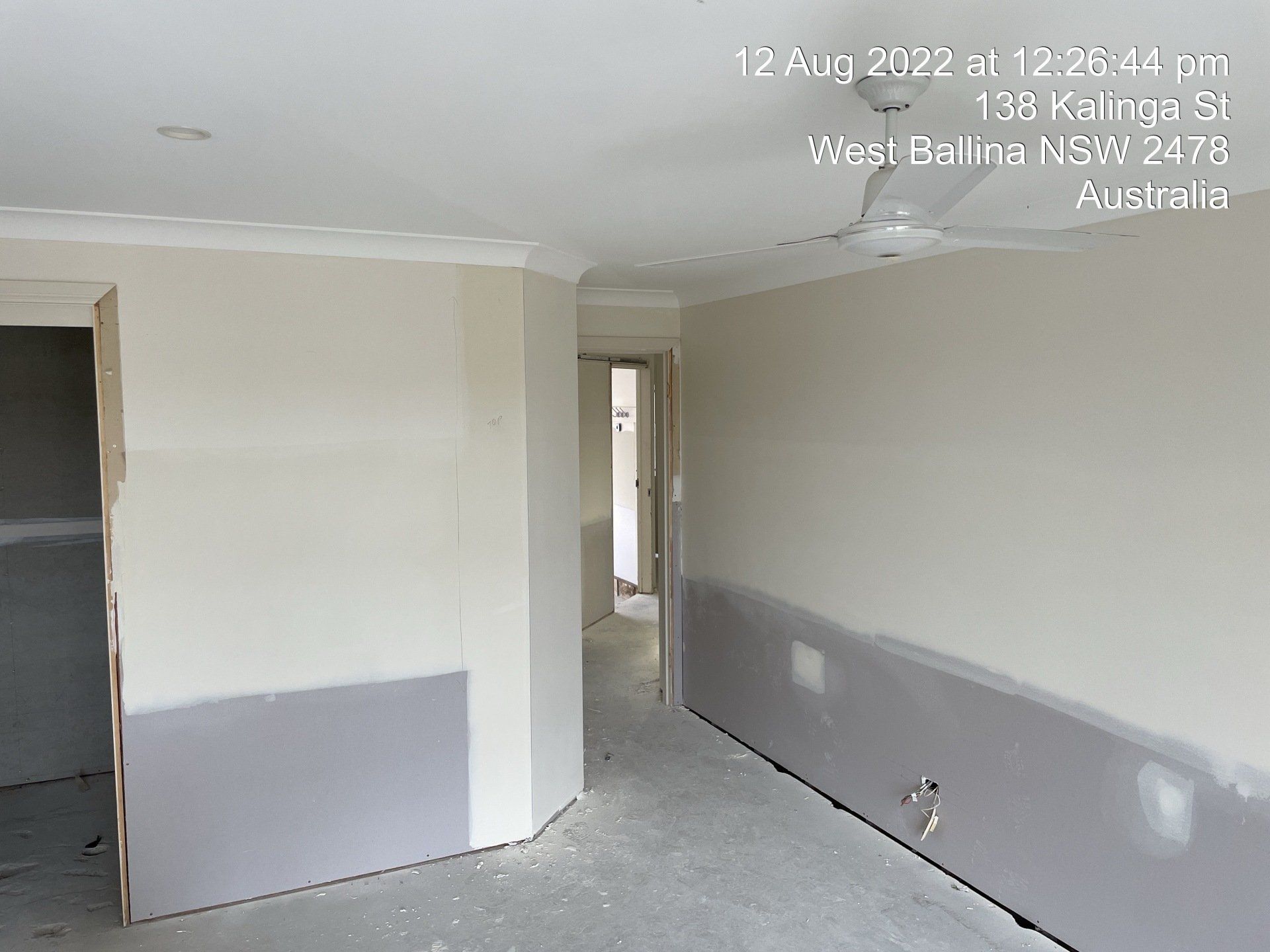 An Empty Room with A Ceiling Fan in It — Completely Plastered North Coast in Goonellabah, NSW