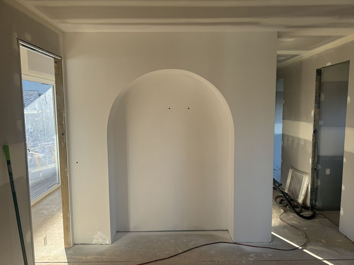 Under Construction Room with A Large Arch in The Middle of It — Completely Plastered North Coast in Goonellabah, NSW