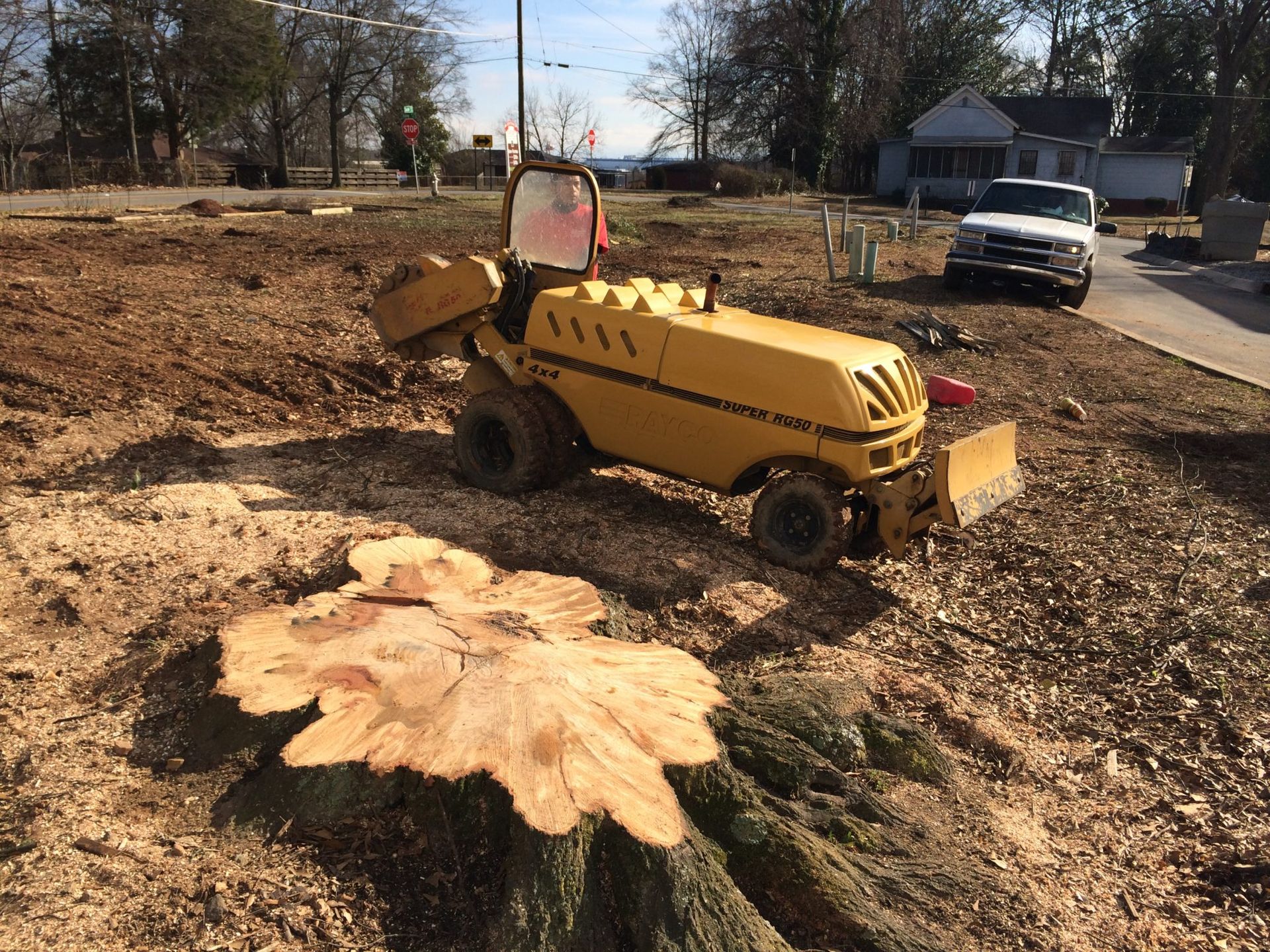 Two excavators are working on a construction site.