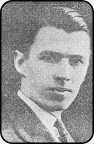 a black and white photo of a man in a suit and tie .