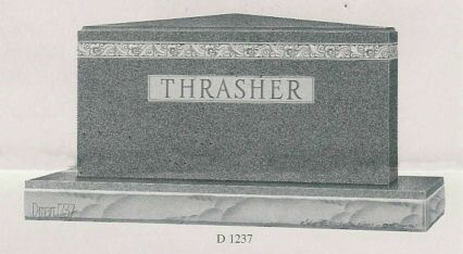 a gravestone with the name thrasher on it