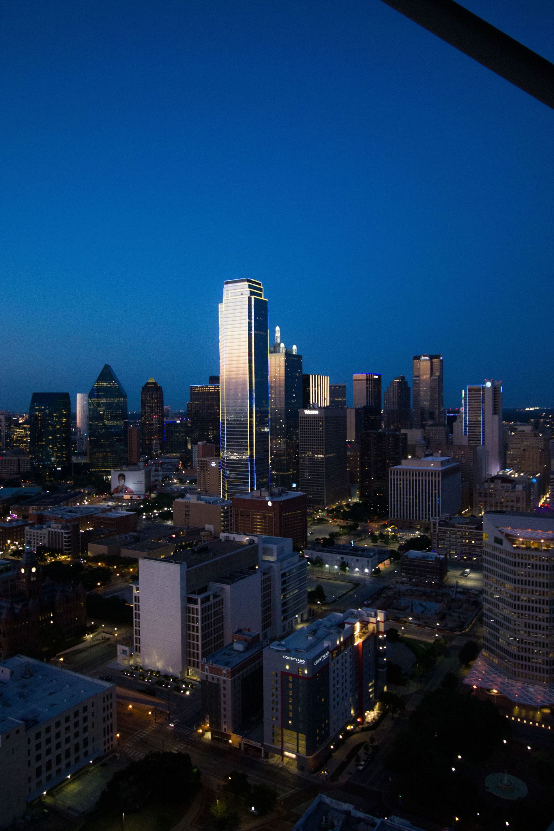 An aerial view of a city skyline at night
