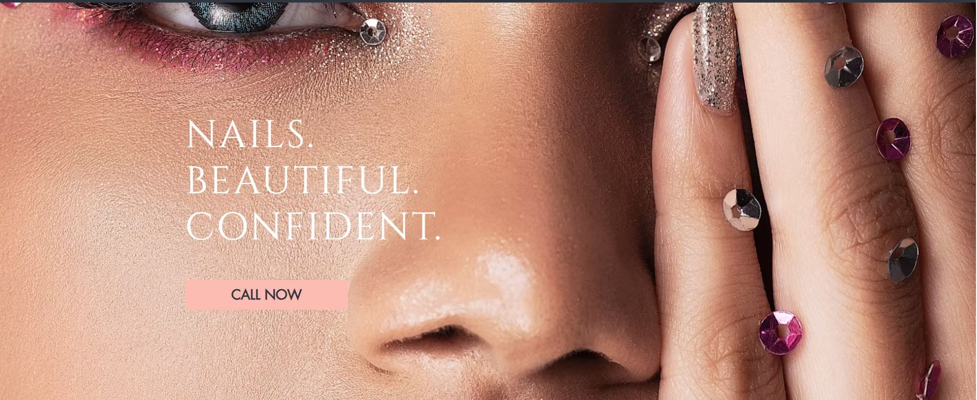 Close-up of a person's face and hand with jeweled nails, promoting nail services; text reads 