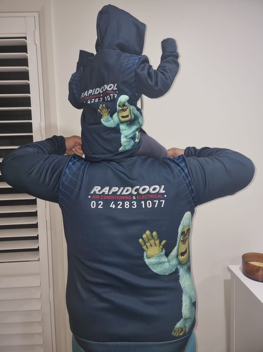 Man And Kid Wearing Rapidcool Jacket — Rapidcool Air Conditioning & Electrical in Illawarra, NSW
