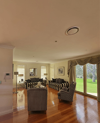 Living Room With Wooden Floor And Ducted System — Electrical, Heating & Air Conditioning in Shellharbour, NSW