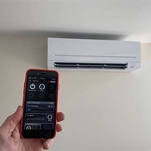 Controlling The Temperature Via Phone — Electrical, Heating & Air Conditioning in Thirroul, NSW