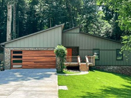 House With A Wooden Garage Door - Flagstaff, AZ - Loren Vickers