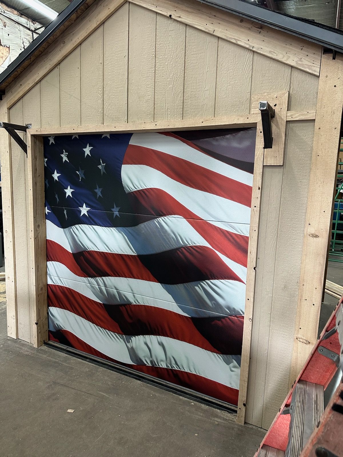 A garage door with an american flag on it