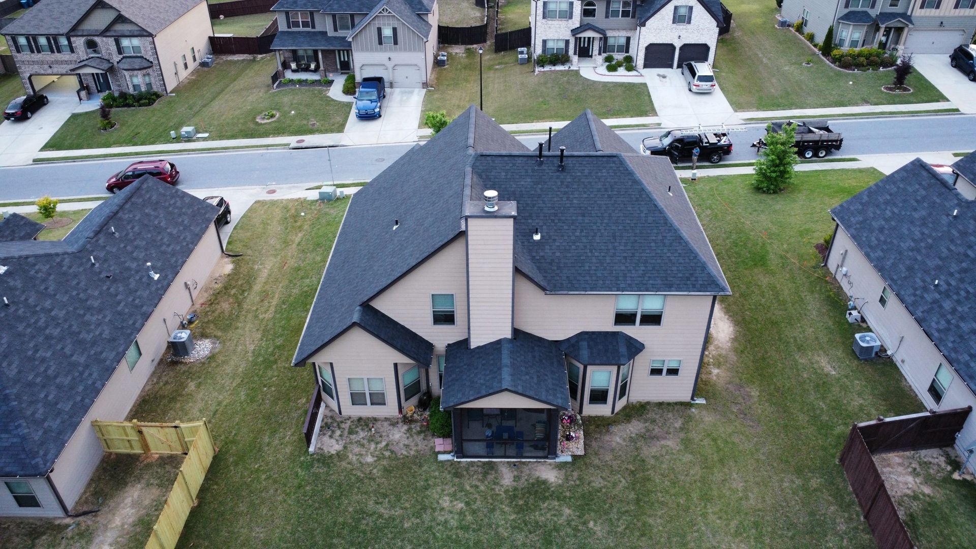 Shingle roof fitting on residential dwelling in Atlanta, Georgia
