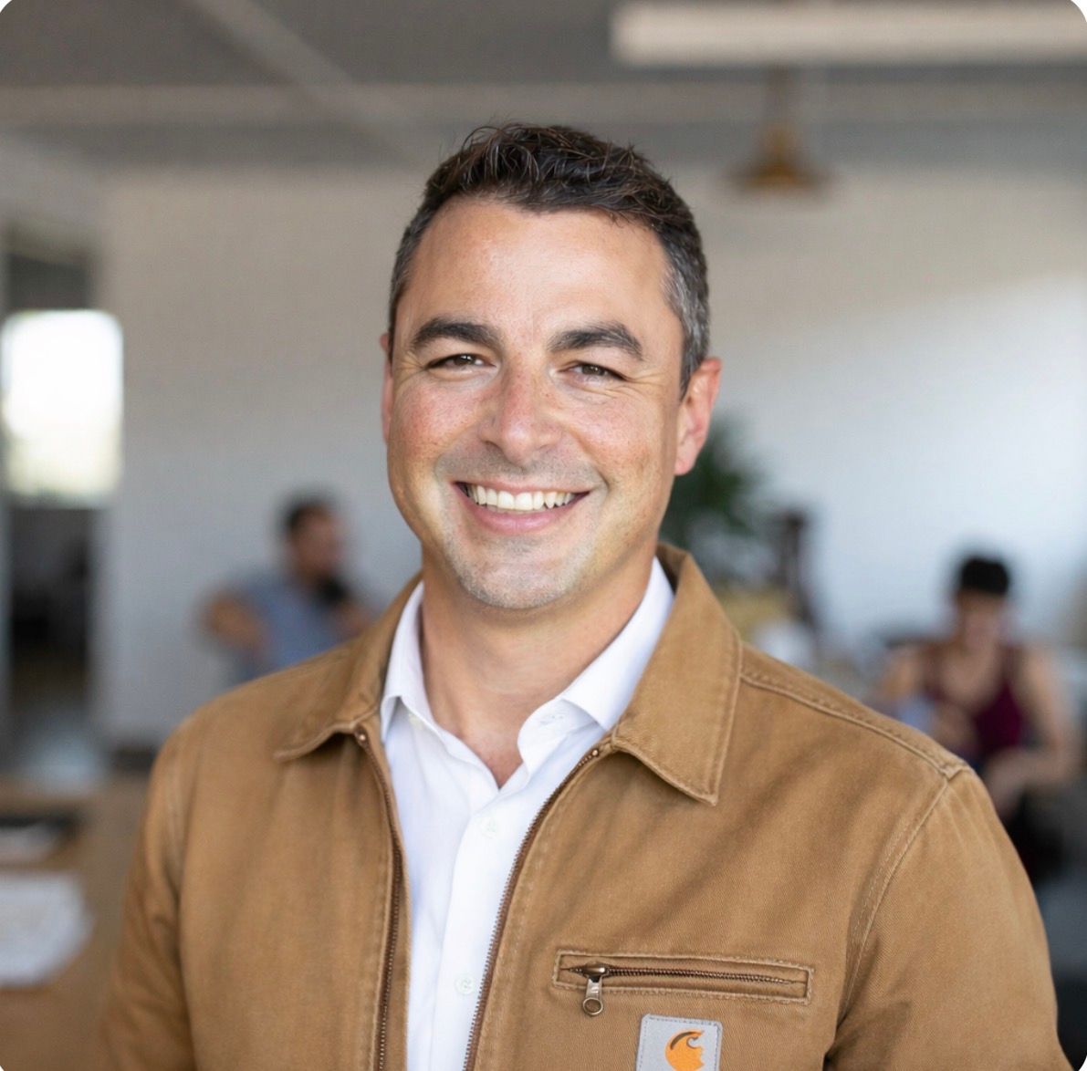 Merck Roofing specialist applying waterproof sealant to a tile roof during a repair in Atlanta, Georgia.