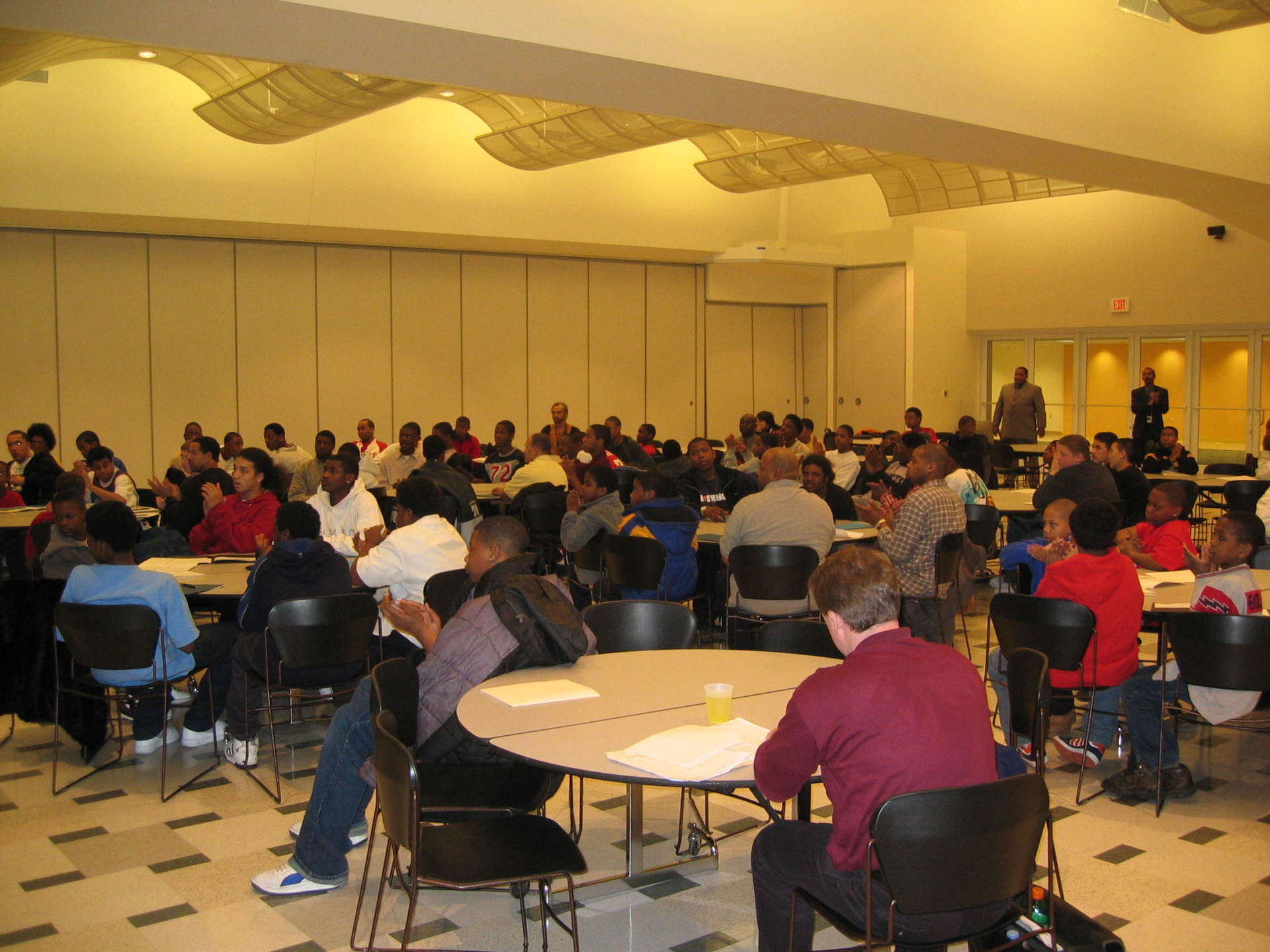 Room filled with students at previous Positive Images Leadership Teen Summit meeting in Milwaukee