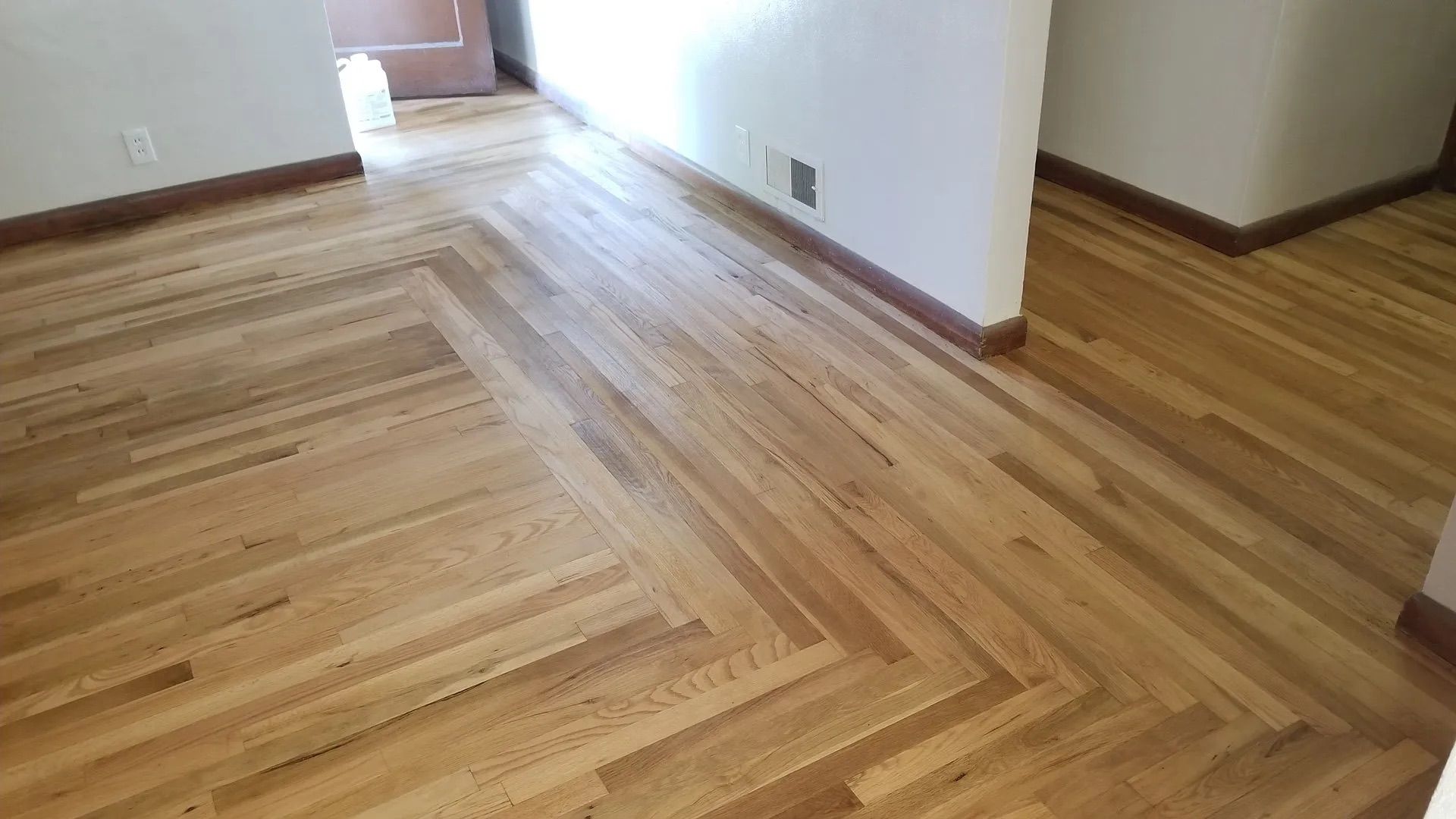 Newly restored hardwood floor in Tacoma, WA by Tuller's Hardwood Floors