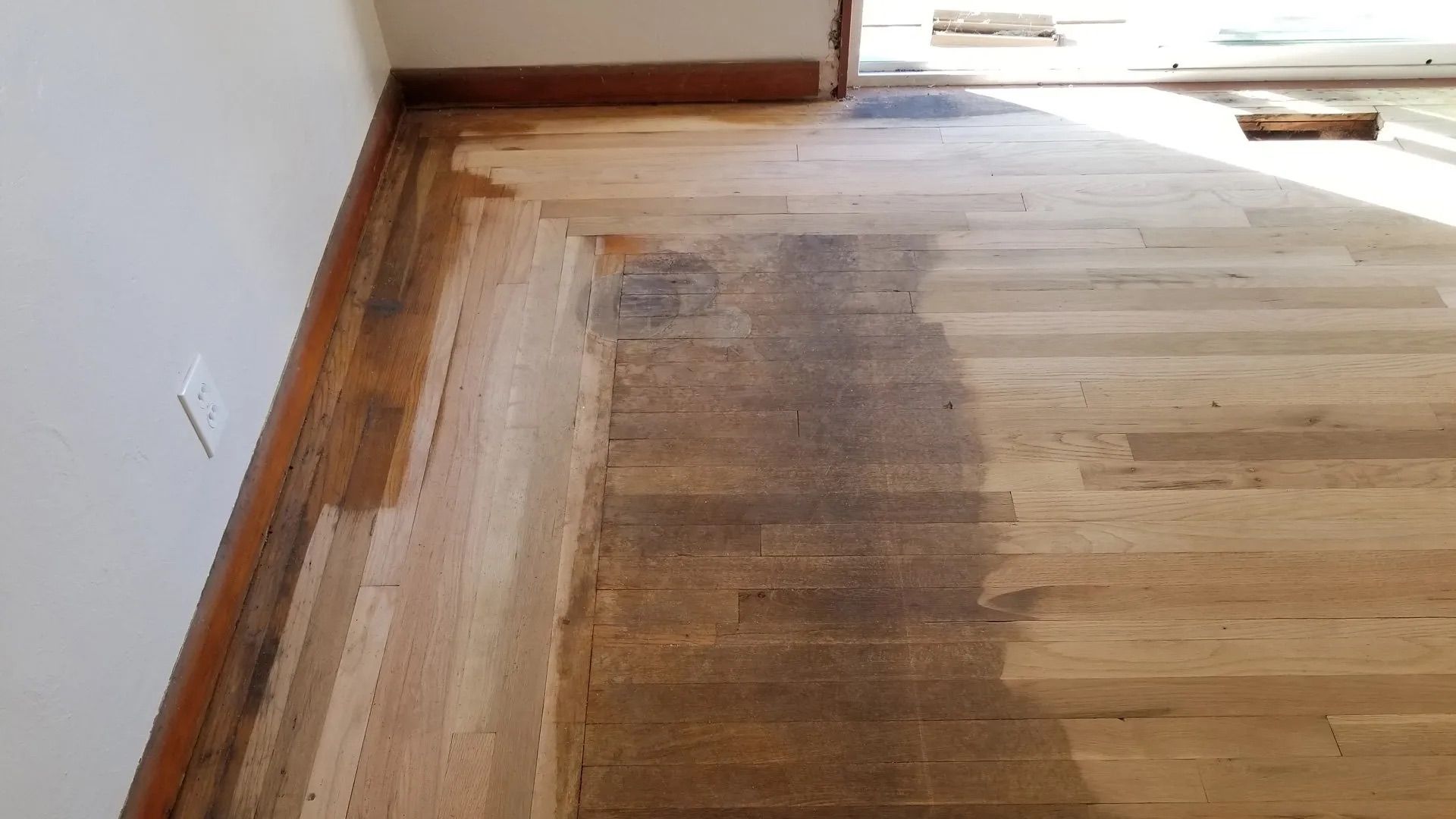 Expert hardwood floor restoration of a damaged floor in Aberdeen, WA