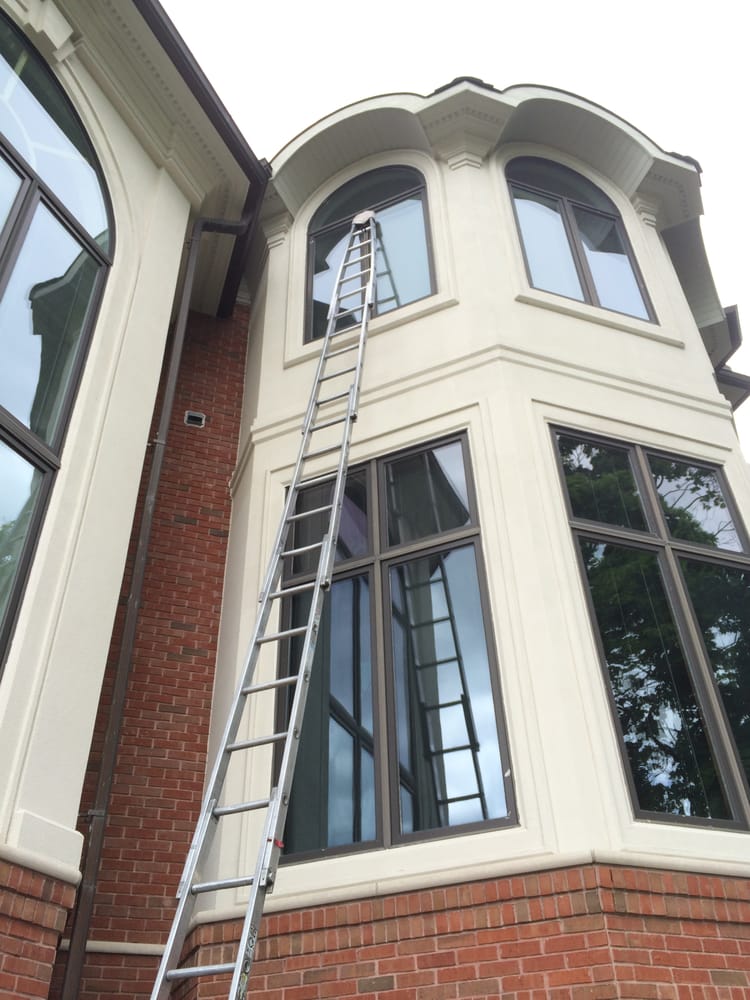 Best Window Cleaners — High Angle View Of A Building With Ladder in Bloomfield, MI