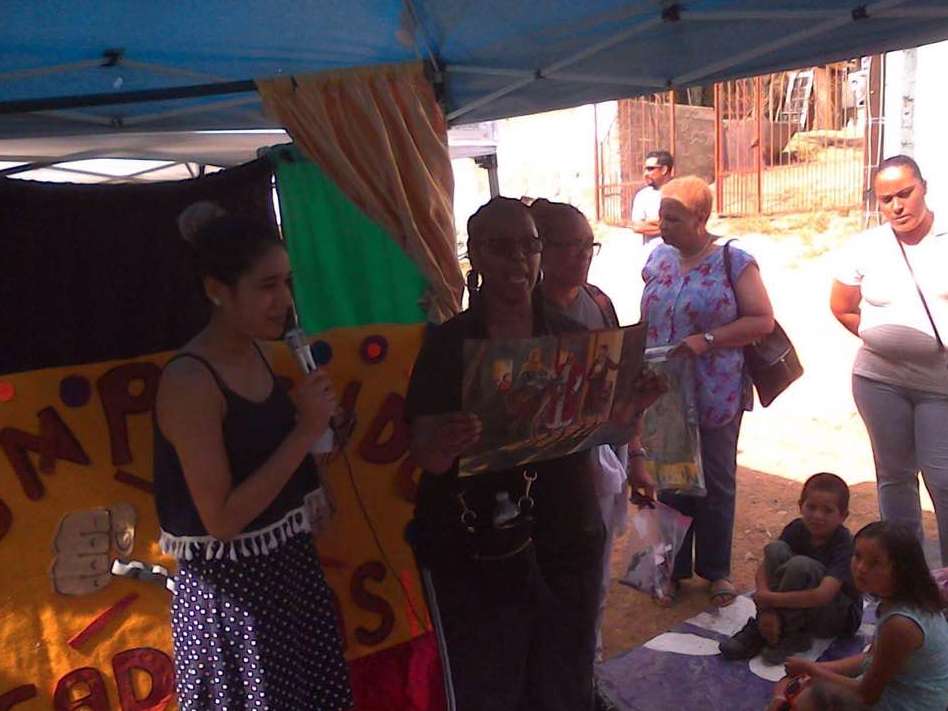 A woman stands in front of a sign that says np