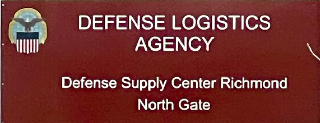A red sign for the defense logistics agency
