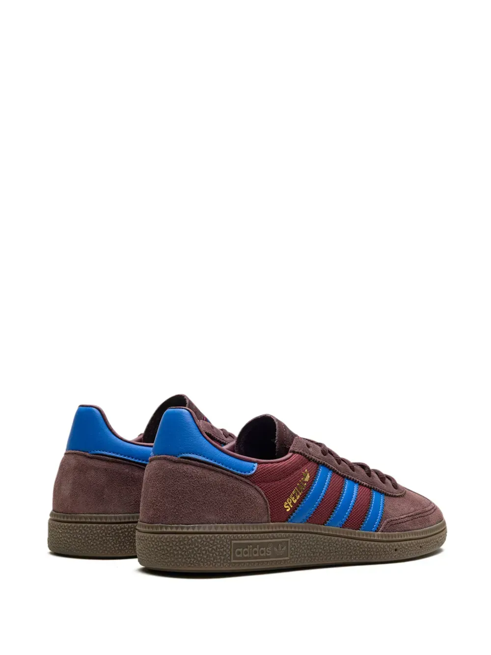 Brown Adidas Handball Spezial sneakers with blue stripes and accents.