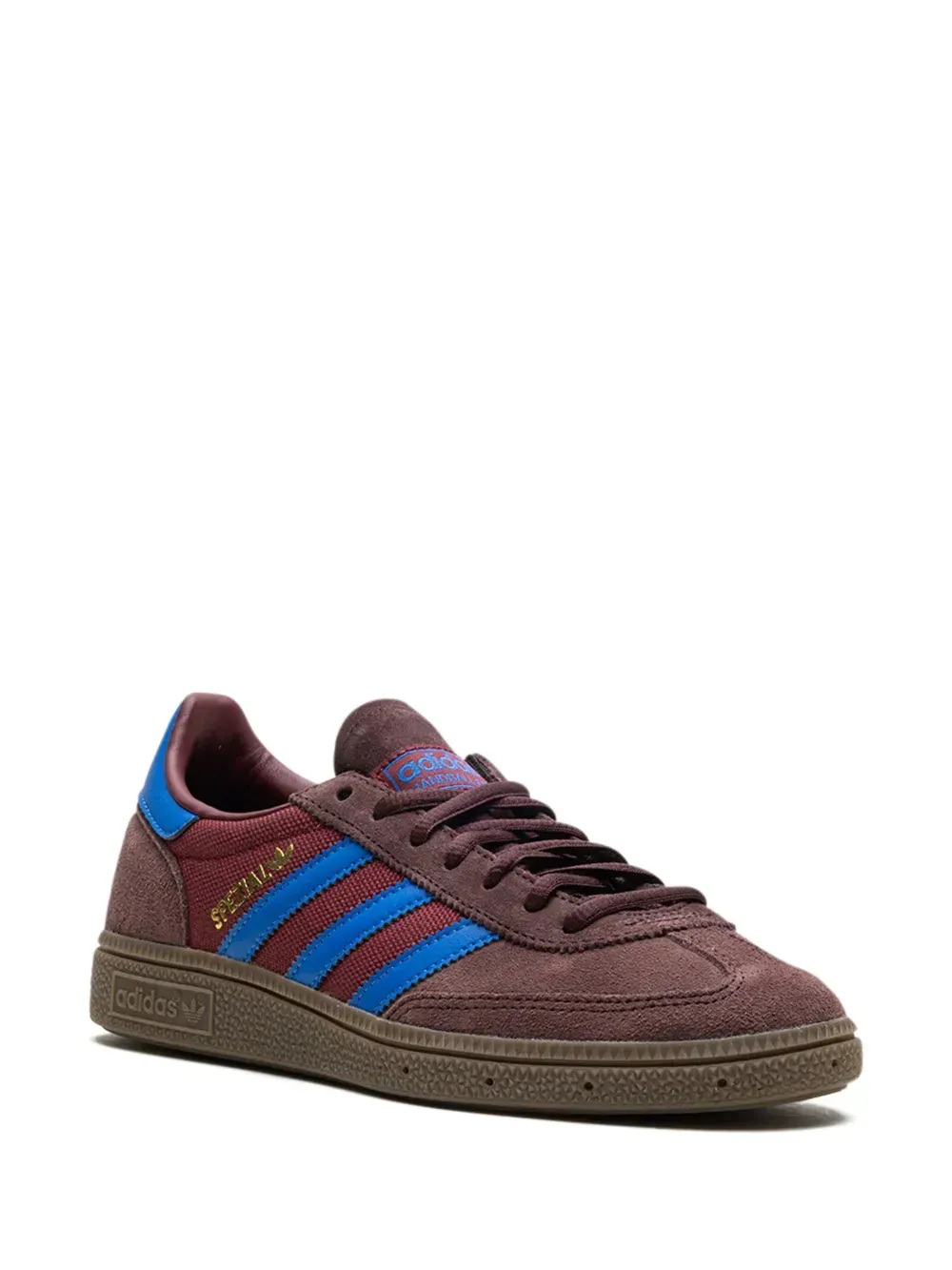 Brown and blue Adidas sneaker with three stripes.