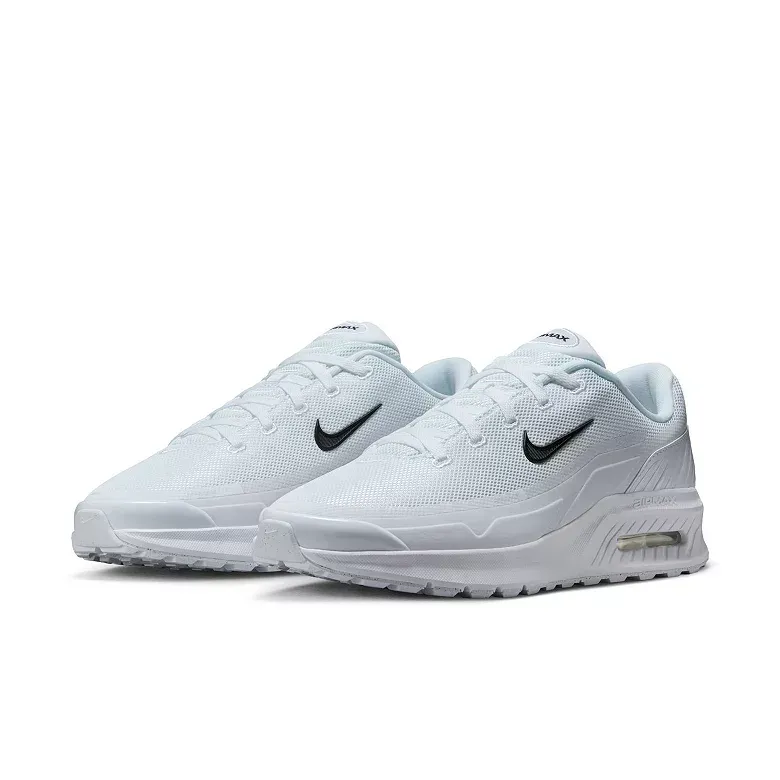 Pair of white Nike Air Max golf shoes with black swooshes.