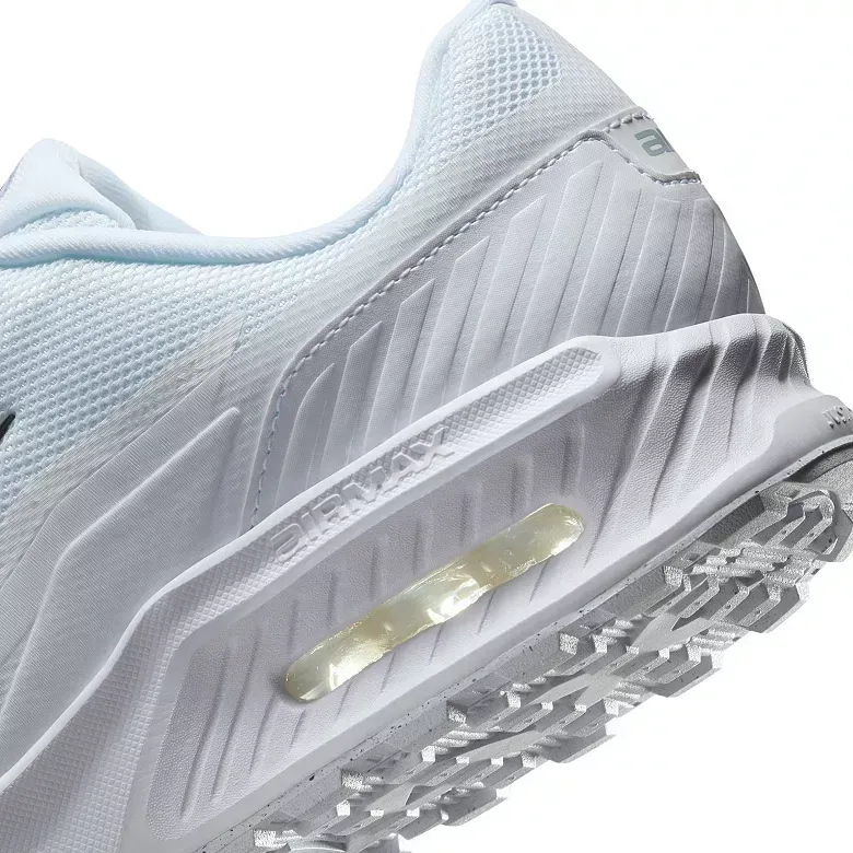 White athletic shoe with visible air bubble in the sole.