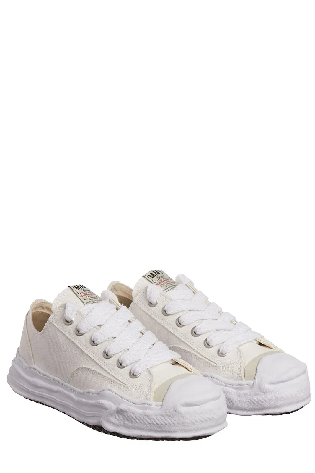 White sneakers with a distressed design.