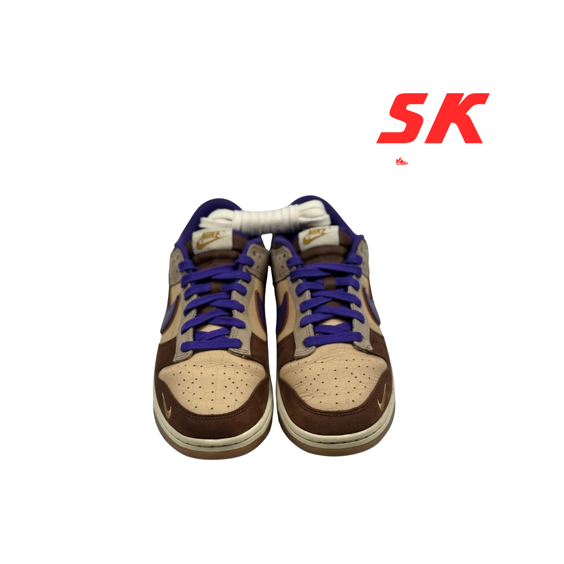 Nike Dunk Low sneakers, tan, brown, and purple, with white laces.