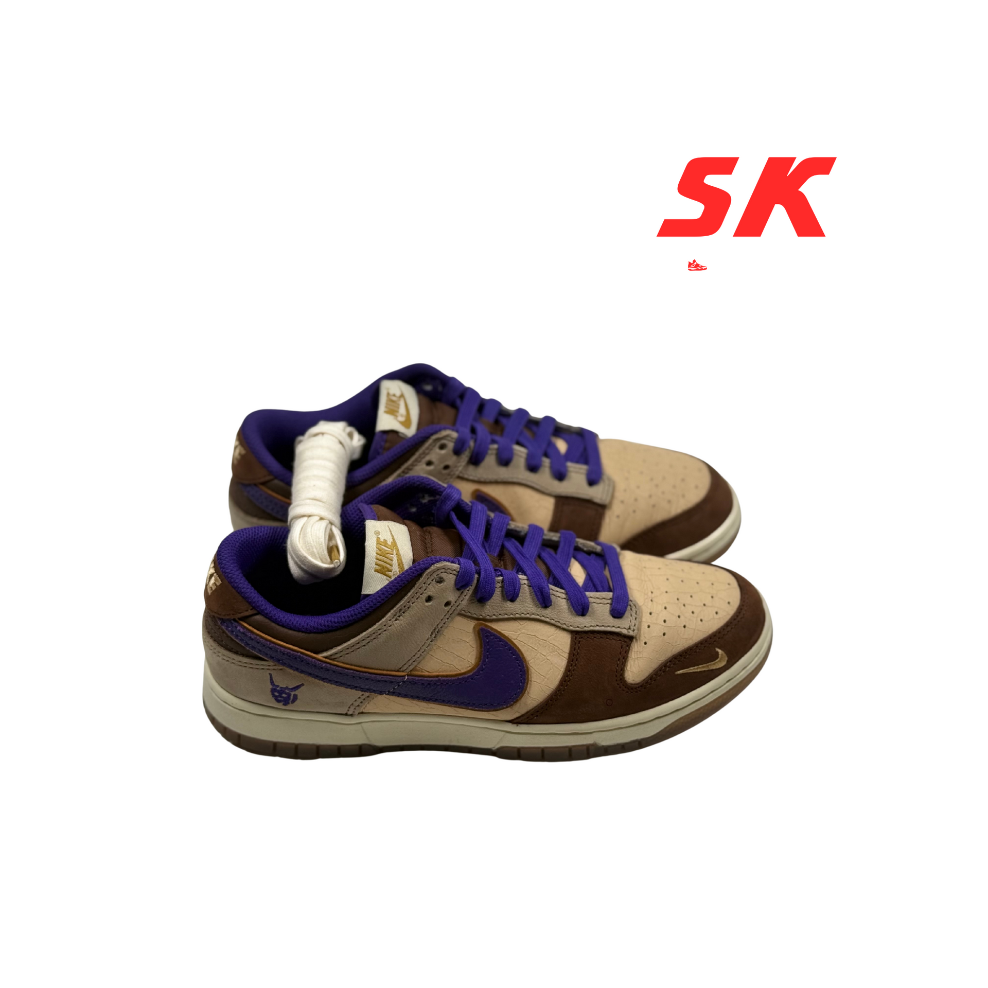 Nike Dunk Low sneakers, tan, brown, and purple, with white laces.