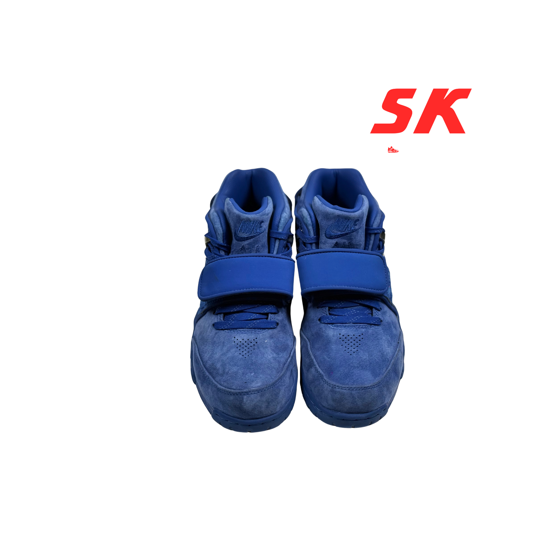 Pair of blue sneakers with strap.