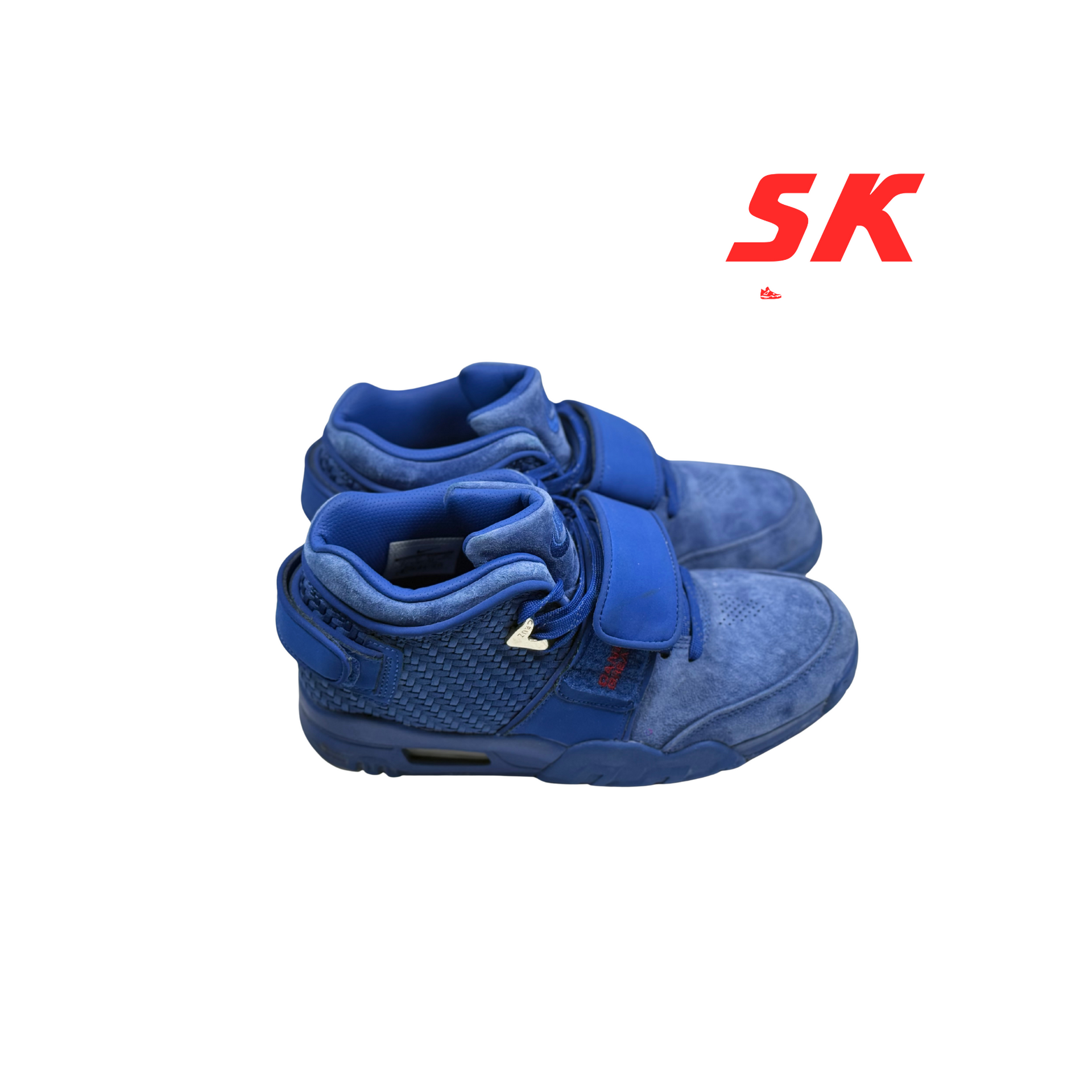 Blue sneakers with velcro straps.