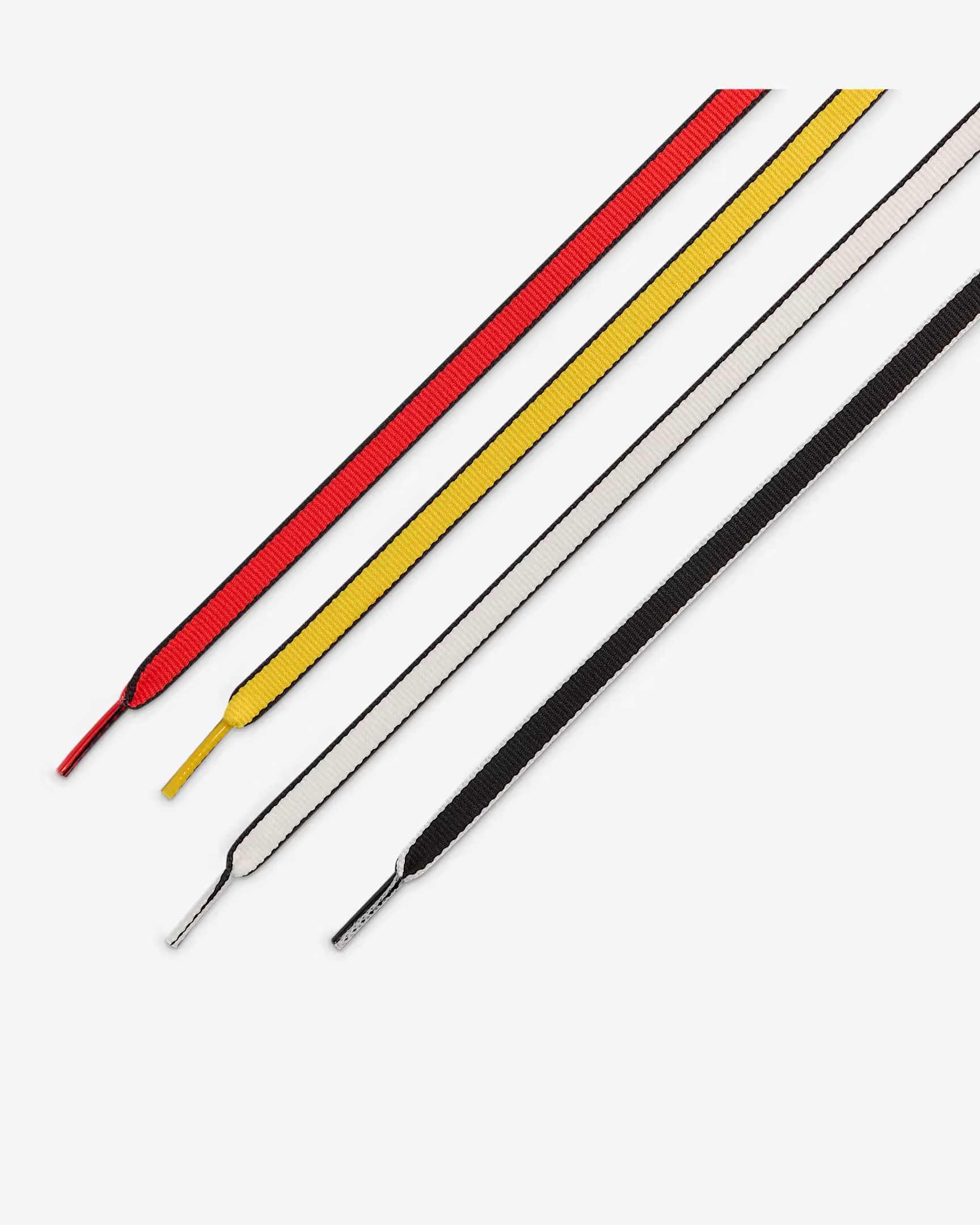 Four shoelaces: red, yellow, white, and black. Angled on white background.