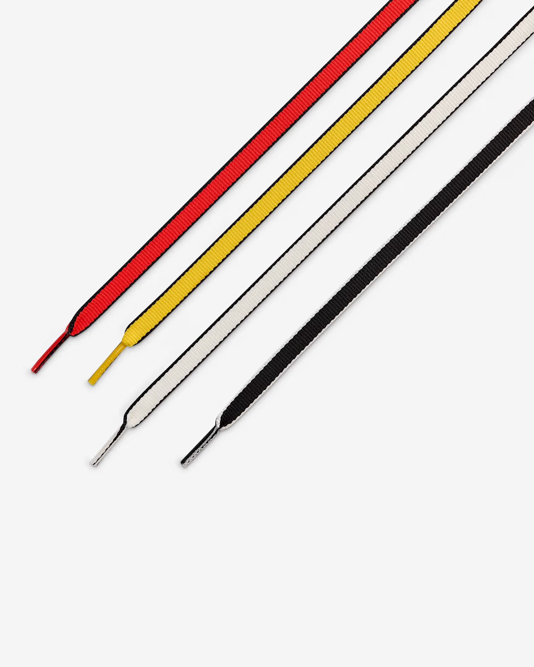 White Nike Dunk Low sneakers with black outline details.