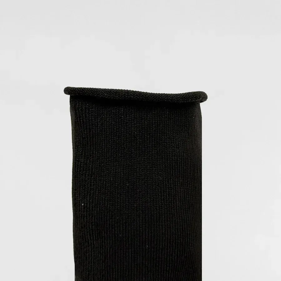 Black ribbed knit sock.