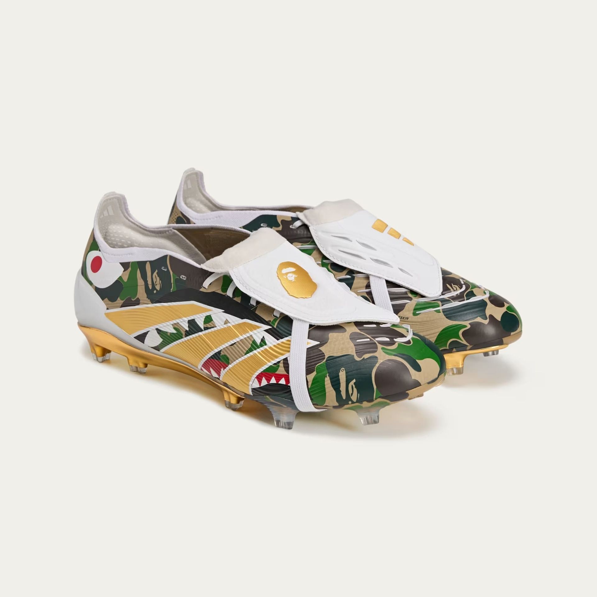 Camouflage BAPE x Reebok soccer cleats with gold accents and signature logos.