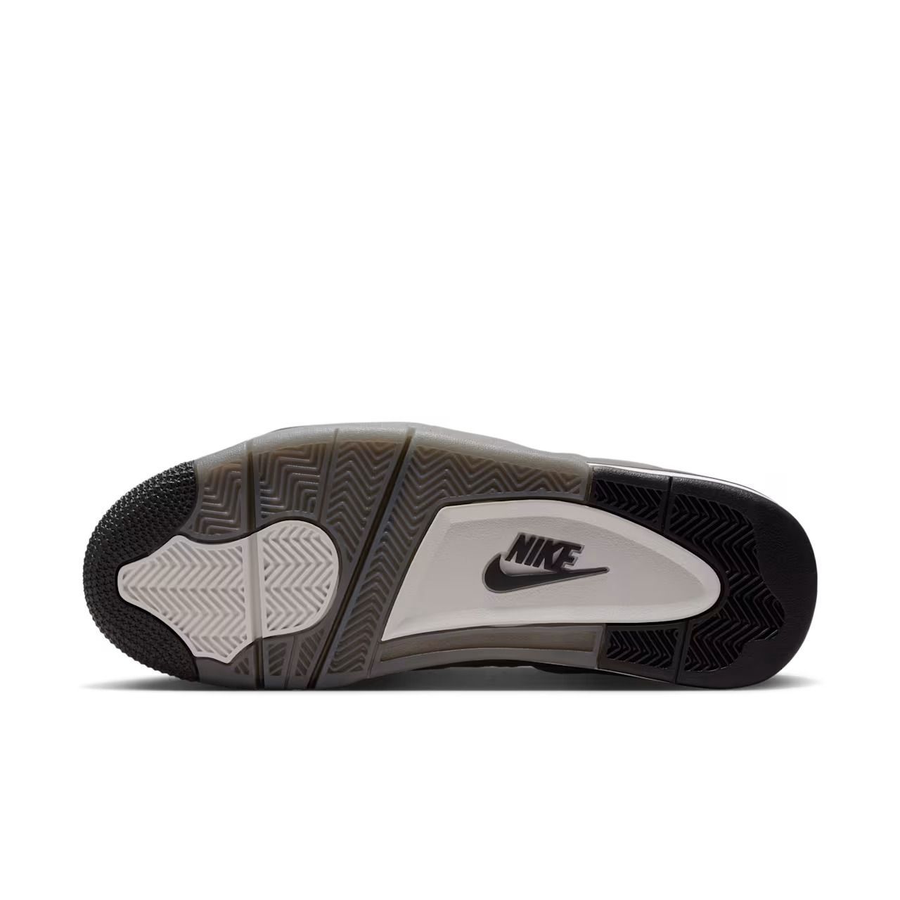 Bottom view of a black, gray, and white Nike shoe sole with the Nike logo.