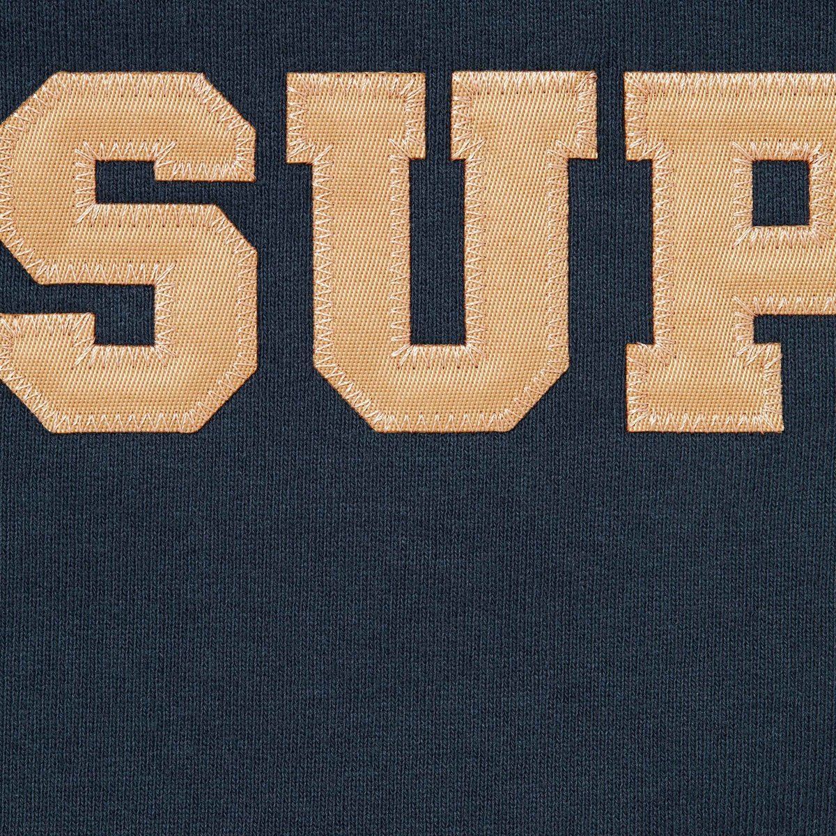 Navy blue Supreme zip-up hoodie with