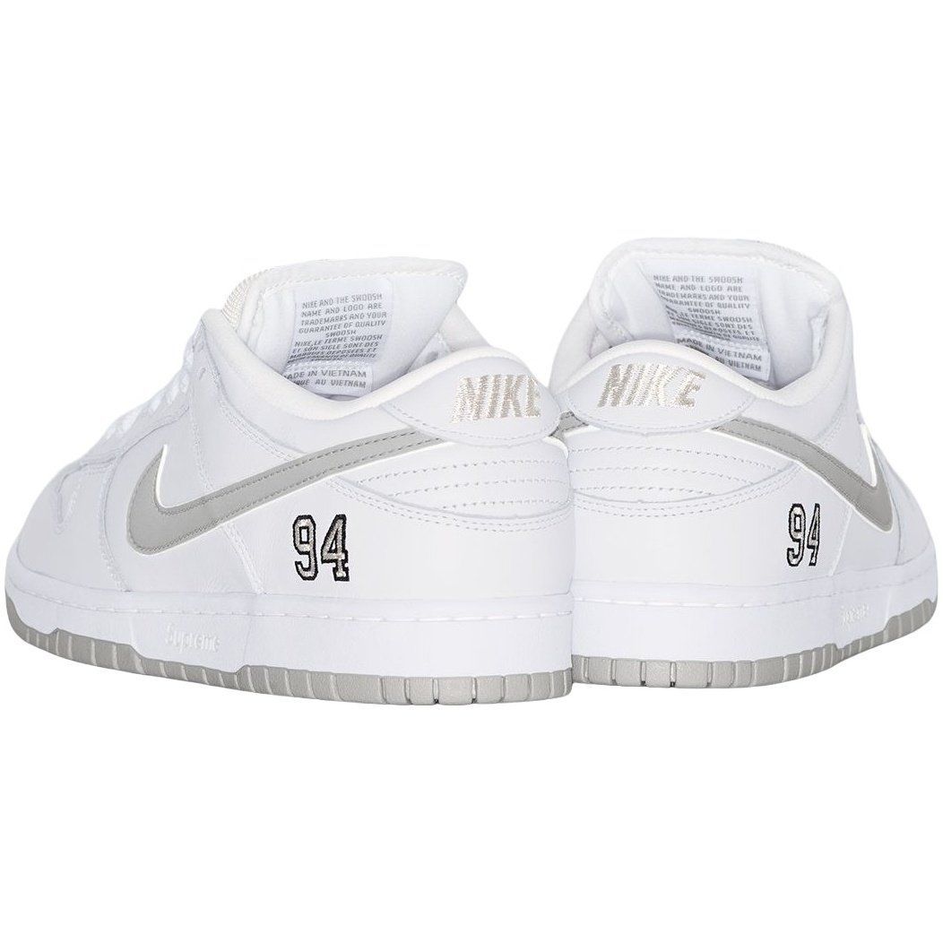 White and gray Nike Dunk Low sneaker with