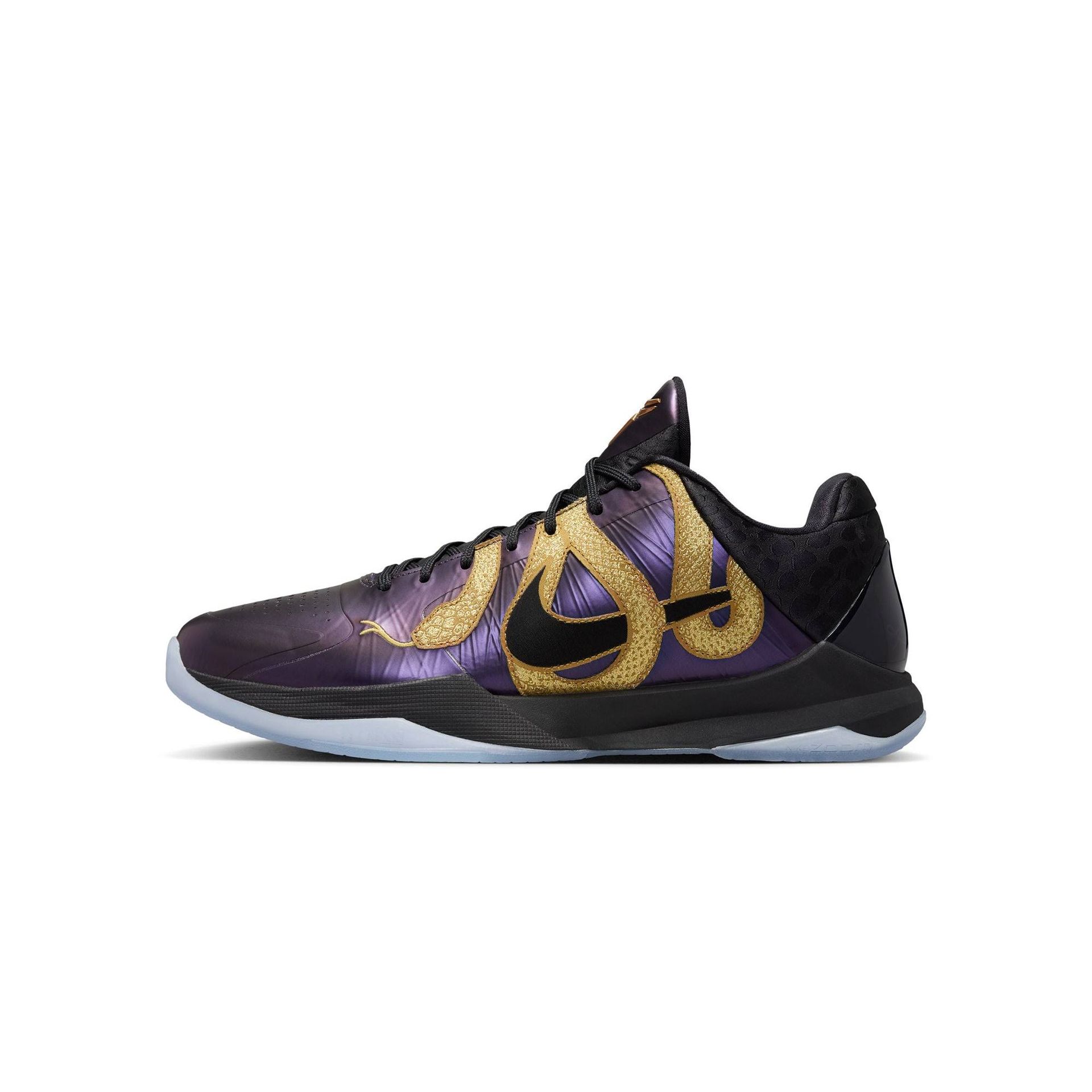 Purple Nike Kobe basketball shoe with gold snake design.