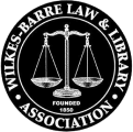 Circular logo for the Wilkes-Barre Law & Library Association, featuring a scales of justice icon and text 