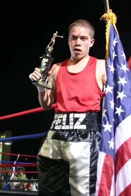 Boxer in red tank top and