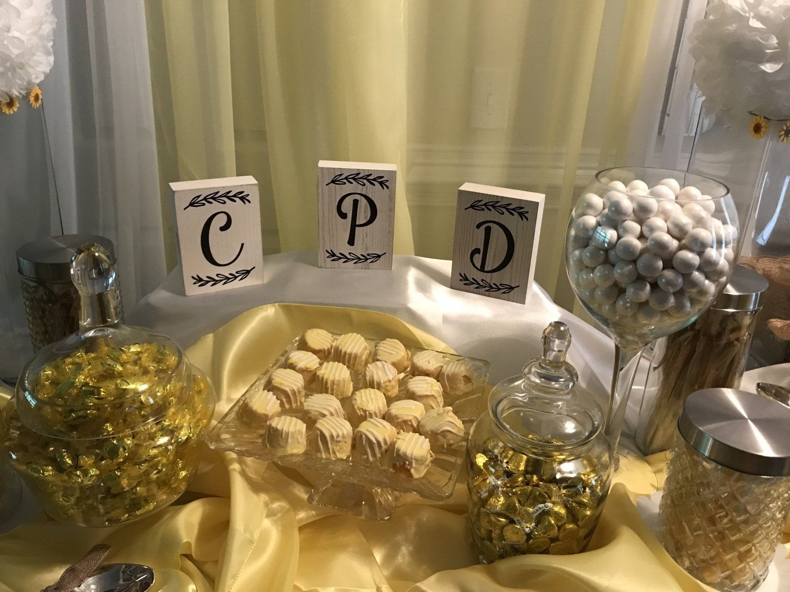 There are many different types of candy on the table.