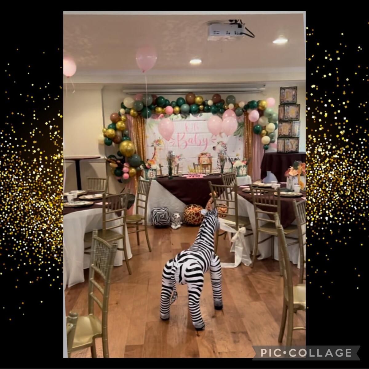 A stuffed zebra is standing in a room with tables and chairs.