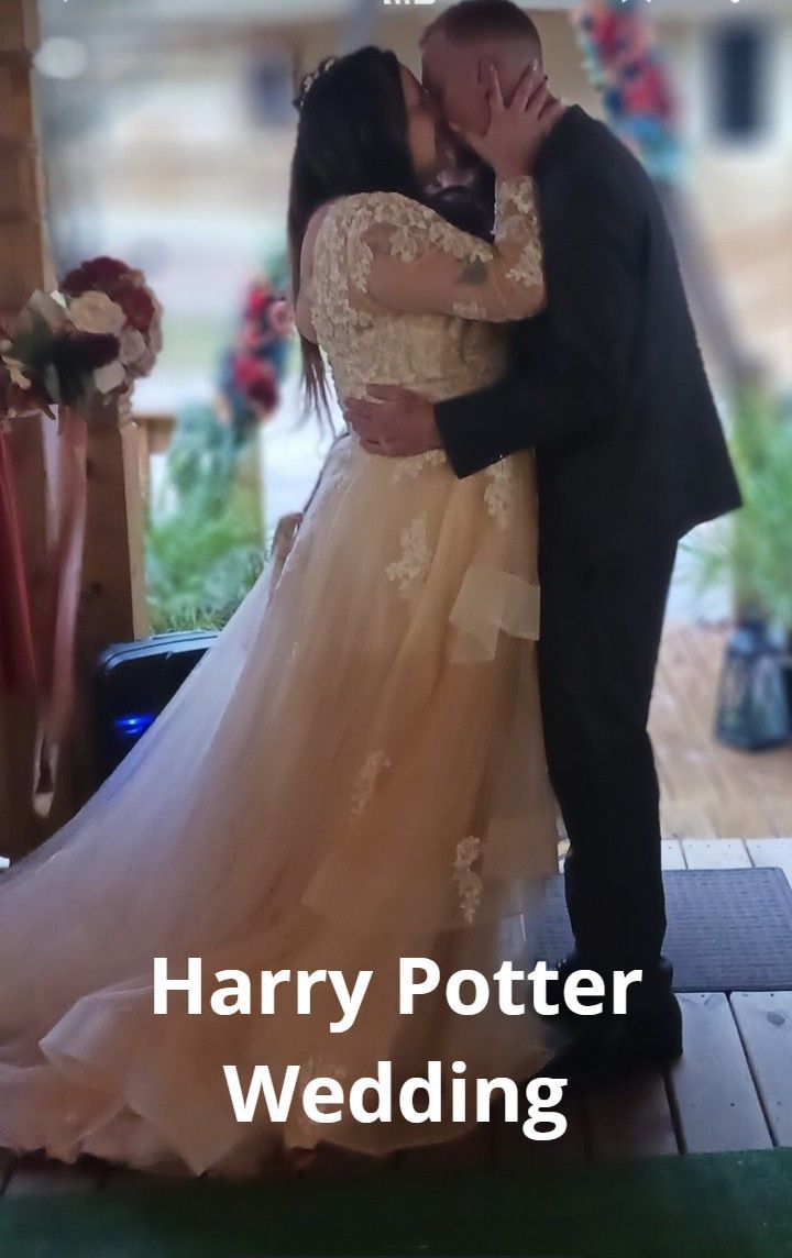 A harry potter wedding with a bride and groom kissing