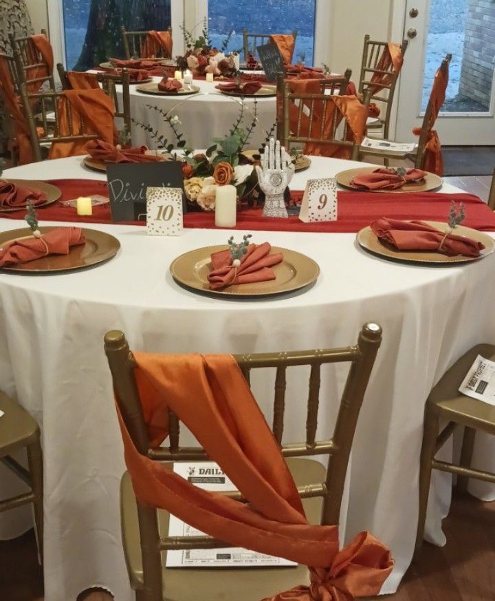 A table with plates and napkins and a table number 10