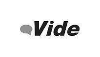 A black and white logo for vide with a speech bubble.