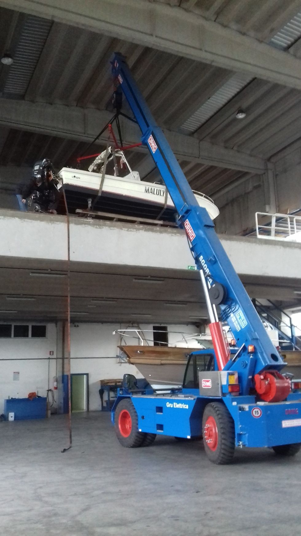 Storage of boats in storage with crane trucks